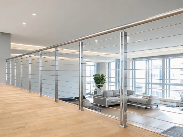 Indoor stainless cable railing along a mezzanine
